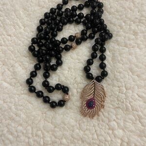 Elegant Black Onyx Beaded Necklace with Pave Crystal Peacock Pendant